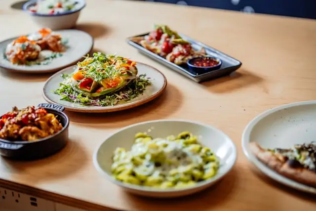 Mediterranean-style meal with colorful vegetables, whole foods, and plant-based ingredients illustrating a balanced diet for weight management and overall health.