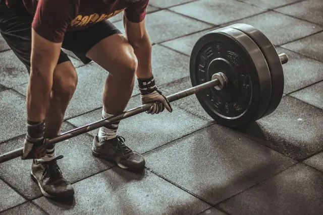 Resistance Training 40-year-old man lifting weights 