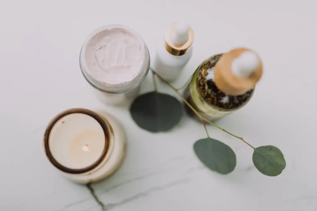 Natural skincare products including collagen cream, serum, and essential oils on a clean surface, illustrating common collagen mistakes and why your supplement isn’t working effectively for skin health and anti-aging