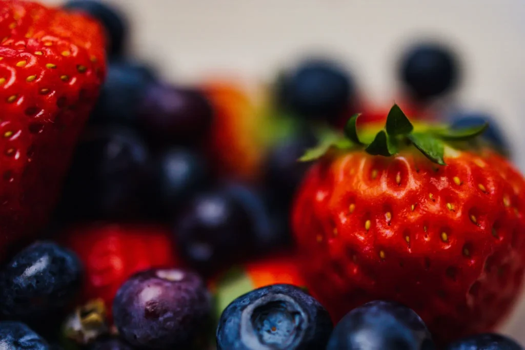 Red berries provide water-soluble antioxidants essential for combating premature aging.