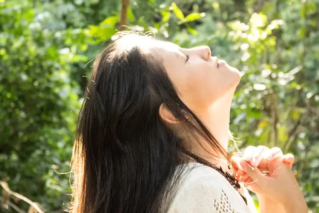 woman in the sun illustrating why does skin get dry during menopause
