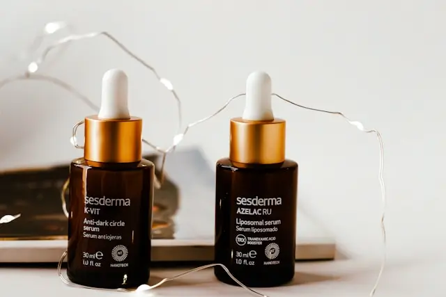 Two bottles of skincare products side by side, symbolizing the comparison between retinol and bakuchiol.
