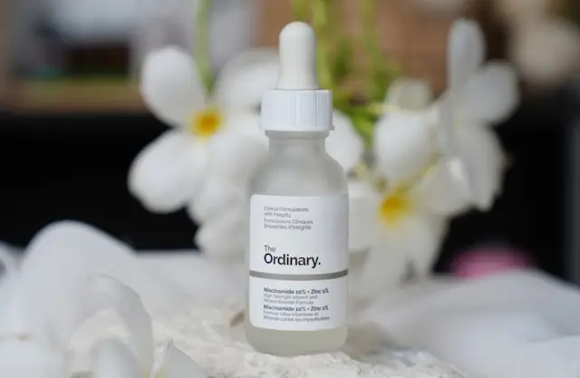 Bottle of serum containing a vitamin A derivative (retinol) used in anti-aging treatments.